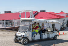 Shuttle ride from your car to the store.Walnut Creek Amish Flea Market in holmes County near Sugarcreek,Ohio in Amish Country,shop antiques and more
